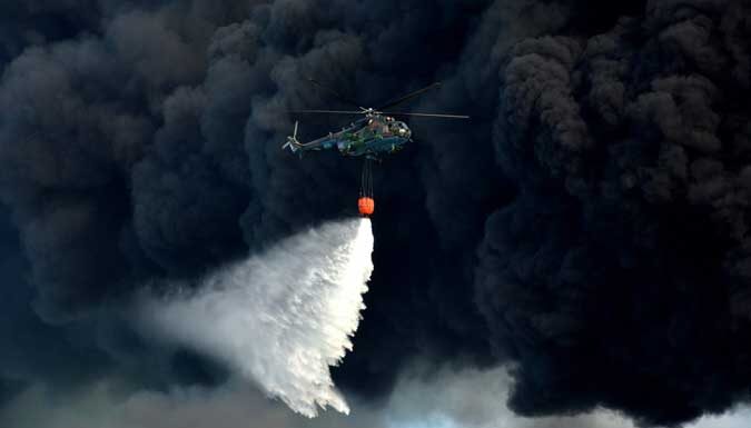 Trabajan arduamente en Cuba para sofocar enorme incendio